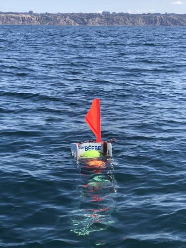 Figure 1. Ocean Lander DOV BEEBE surfaces off the coast of La Jolla, California. (Photo by Ashley Nicoll, Scripps Institution of Oceanography/UCSD)