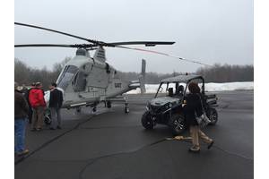 The K-MAX helicopter, seen here with the unmanned UxInterceptor vehicle, can be operated in the manned or unmanned mode, and can lift 6,000 lbs.