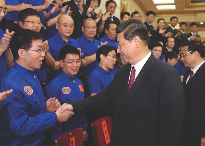 Professor Cui Weicheng receiving the title “National Hero of China,” from PRC President Xi Jinping, following his successful dives to over 7,000m in the submersible Jiaolong. (Image: Professor Cui Weicheng, Shanghai Ocean University)
